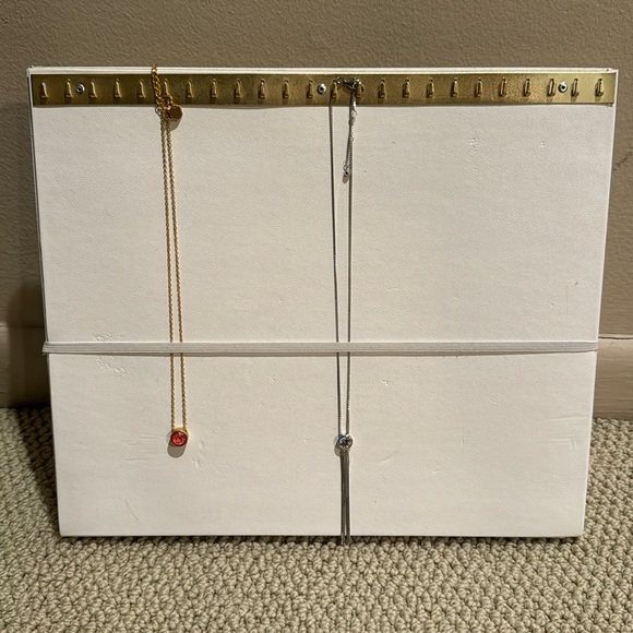 24 hook white necklace display.  Elastic strap stabilizer. - Picture 1 of 5